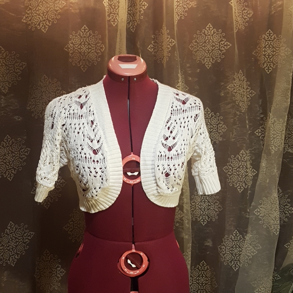 White knitted cardigan.